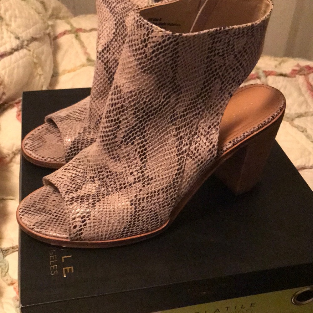 Very volatile snake print booties